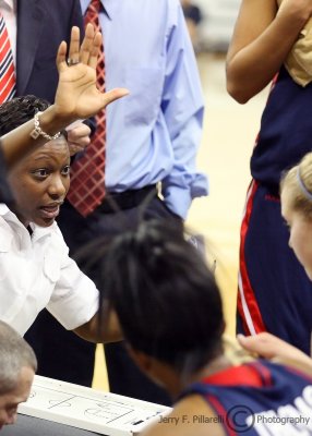 Arizona Wildcats Head Coach Niya Butts talks to her team during a timeout