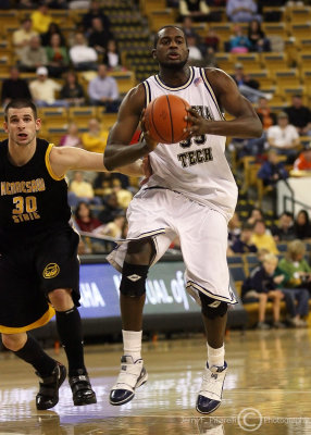 Georgia Tech F Peacock passes from the top of the three point line