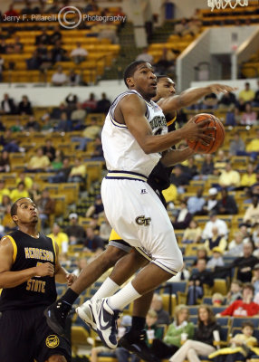 Yellow Jackets G Nick Foreman drives to the basket