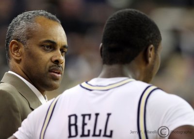 Georgia Tech Yellow Jackets Head Coach Paul Hewitt talks to G Bell during a timeout