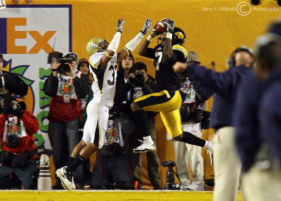 Jackets CB Tarrant arrives too late to stop a touchdown catch by Hawkeyes WR Marvin McNutt