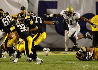 Yellow Jackets DE Derrick Morgan leaps in pursuit of the ball