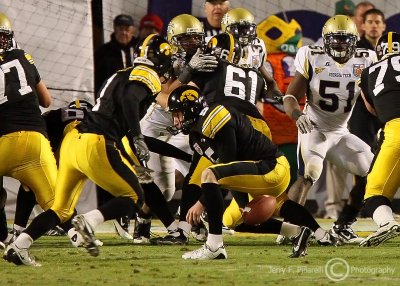 Iowa P Ryan Donahue laterals the ball to PK Daniel Murray on the fake field goal attempt