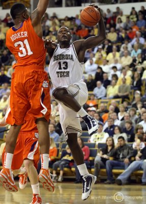 Yellow Jackets G Bell drives the baseline against the defense of Tigers F Devin Booker