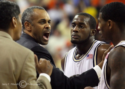 Georgia Tech Yellow Jackets Head Coach Paul Hewitt talks to his players during a timeout