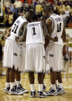 Yellow Jackets G Bell talks to his teammates on the floor near the end of the game