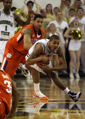 Georgia Tech G Rice secures the ball at mid-court after Clemson looses it on their last attempt to score