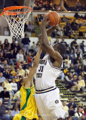 Yellow Jackets F Lawal goes in strong for the contested basket