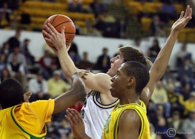 Georgia Tech F Sam Shew takes the ball to the hoop