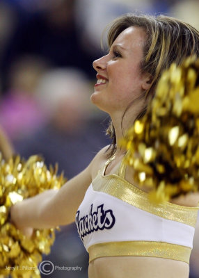 Georgia Tech Yellow Jackets Dance Team member performs during a timeout