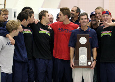 Arizona Coach Busch and Team with Trophy