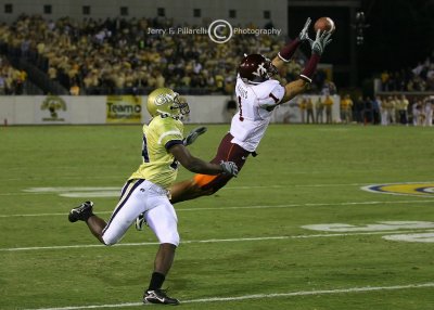 VT CB Victor Harris leaps in front of GT WR James Johnson