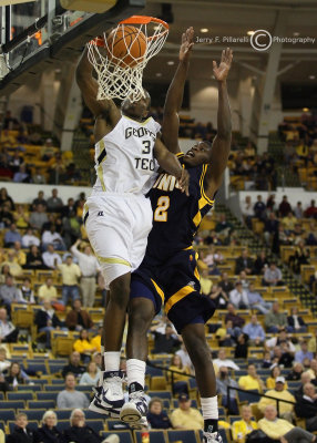 Jackets F Lawal slams over Spartans F Sellers