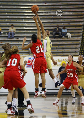 Tech F Alex Montgomery steals the tip from Davidson F Mercedes Robinson