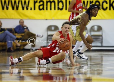 Davidson G Alexandra Thompson fights to maintain control of the ball