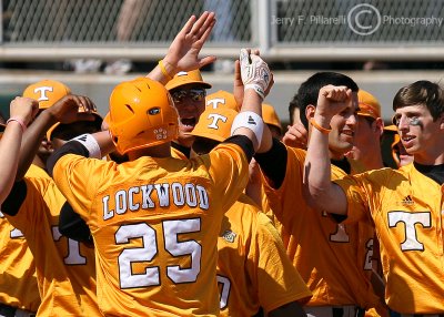 Tennessee Volunteers 1B Jeff Lockwood celebrates his home run with teammates