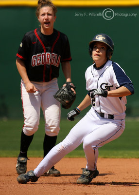 GT SS Morales watches the ball while leading off second in front of UGA SS Wiggins