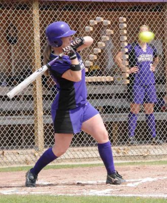 Heather Checks Her Swing