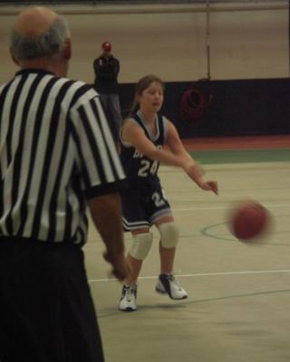 Caitlin bounces a pass