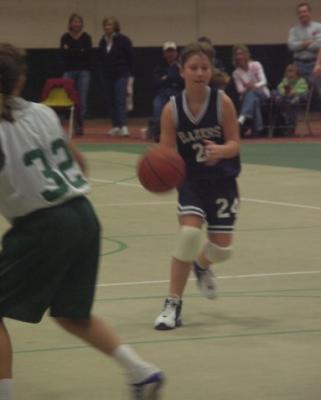Caitlin drives the lane