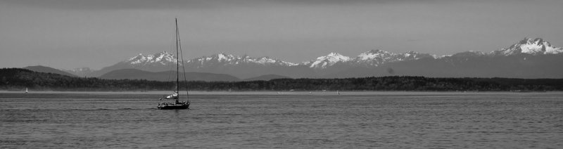 Snowcaps and sailboat