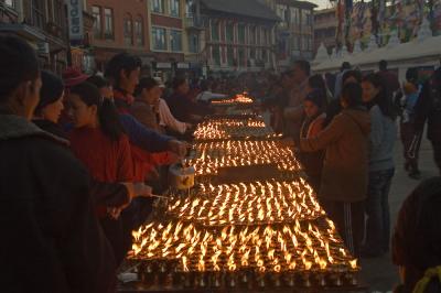 Lighting up at Boudanath