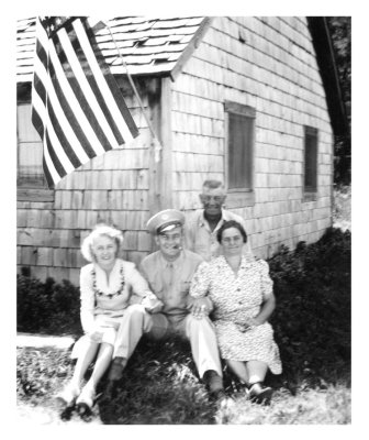 Above we see Harold Robinson, sitting between his new bride and his mother. Left to right: Lucille Alena [Mattson] Robinson, Harold Everette Robinson, Othilla Tillie [Hahn] Robinson. Sitting on the back is, Everett Daniel Robinson. This photo comes to us courtesy of, Nancy [MacDougall] Evans.  