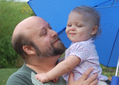 Vati with his kleine engel. That little girl is the source of 55% of every smile I crack. Her mama is usually the source for the other 45%.