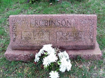 Above we can see a photograph of the gravestone of Arthur George Robinson and his wife, Roselee [St. Armour] Robinson. This couple married in 1907 and shared ten children together. They're buried in Elk Cemetery, Elk TWP., Sanilac, MI