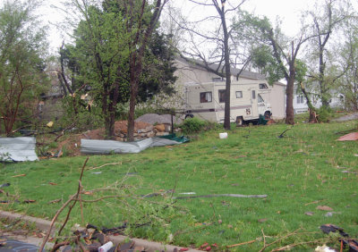Here you can see the debris field scattered all around this house.