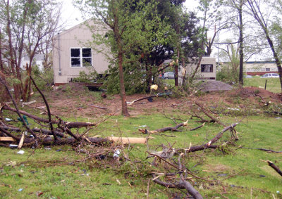If you look closely at this house, you can see its windows have all been sucked out just like the RV parked next to it. The air pressure must have been terrific.