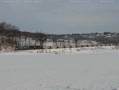 Standing in a 3 foot drift to get this shot of a westbound.jpg