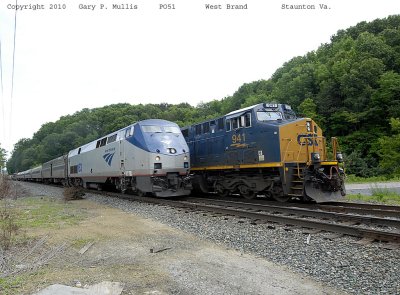 Amtrak passes the grainer at Brand.jpg