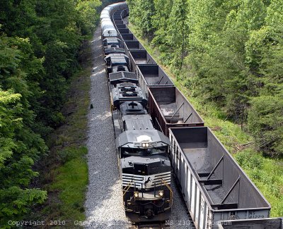 23G passes a hopper train at Possum.jpg