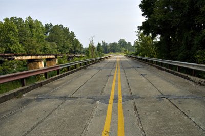Old Bridge next to railroad tracks