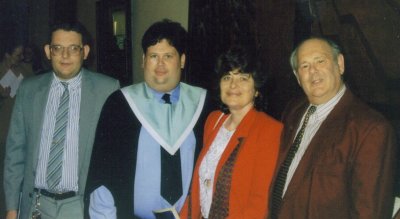 Ivor at his graduation ceremony with his brother Barry and parents  Esther and Joseph