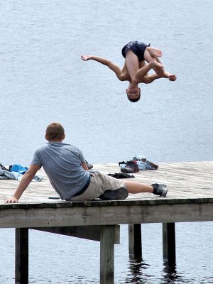 A summer day on the Tennessee River.  We went to a park in Scottsboro, AL and saw these boys diving off the end of the pier.  Just a shot of opportunity but it was a nice warm summer afternoon.
