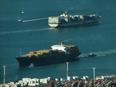 My first submission is 'OOCL Melbourne meest MSC Rugby'. They are two containerships, one leaving, one arriving on August 4th 2009, photographed from the Sky Tower in Auckland, New Zealand.

Olympus SP-570UZ - 1/320s f/4.2 at 66.0mm iso64. Darkened in PSE7 'Levels', Shadows and Highlights +RED.
 
