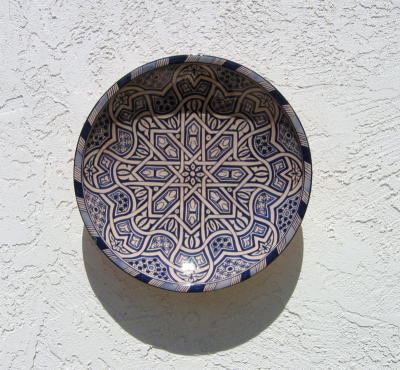Plate on Courtyard Wall at Cezar and Merrie's House