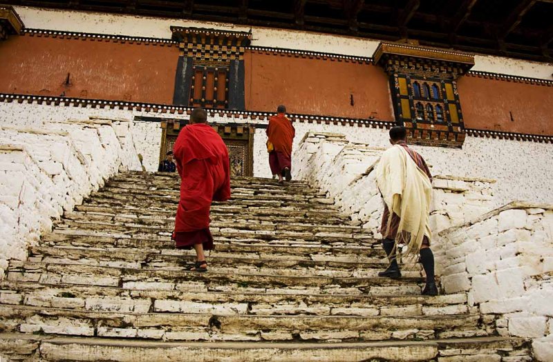 Monks walking up to the Entry of the Paro Dzong
