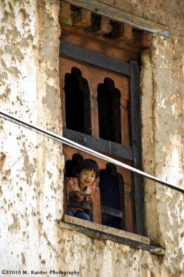 Girl in window; Rinchengang Village