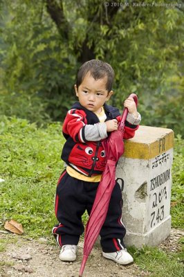 Boy with  umbrella