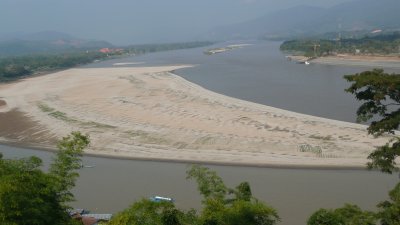 Back in Thailand, we look down on the confluence of the Ruak and Mekong rivers.  Burma is on the left, Laos on the right.