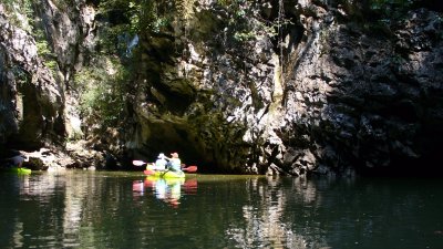 We paddled from sun-dappled caverns