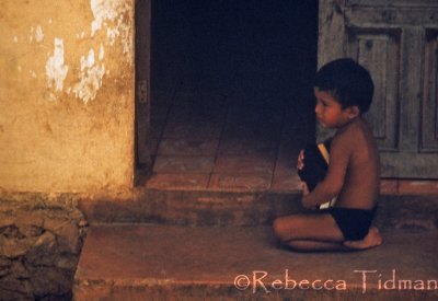 Mexican Boy, From a Bus Window