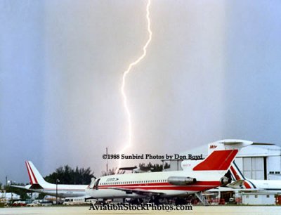1988 - lightning striking in Miami Springs beyond aircraft parked south of the Midway hangar