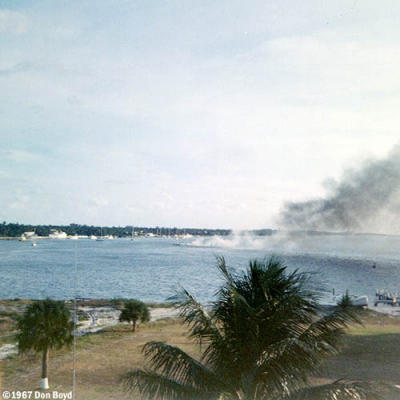1967 - boat explosion and fire in front of CG Station Lake Worth Inlet on Peanut Island - view from lookout tower