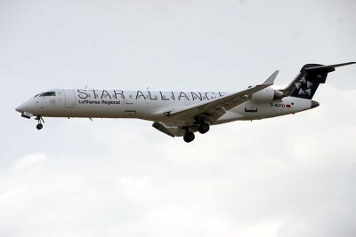 Wearing the Star Alliance colour, this LH's CRJ-700 appears almost monochrome in cloudy weather