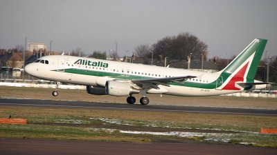 A-319 in Alitalia new colour taking off from LHR RWY 27R