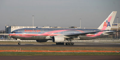 Pink AA B777 taking off from LHR Runway 27R